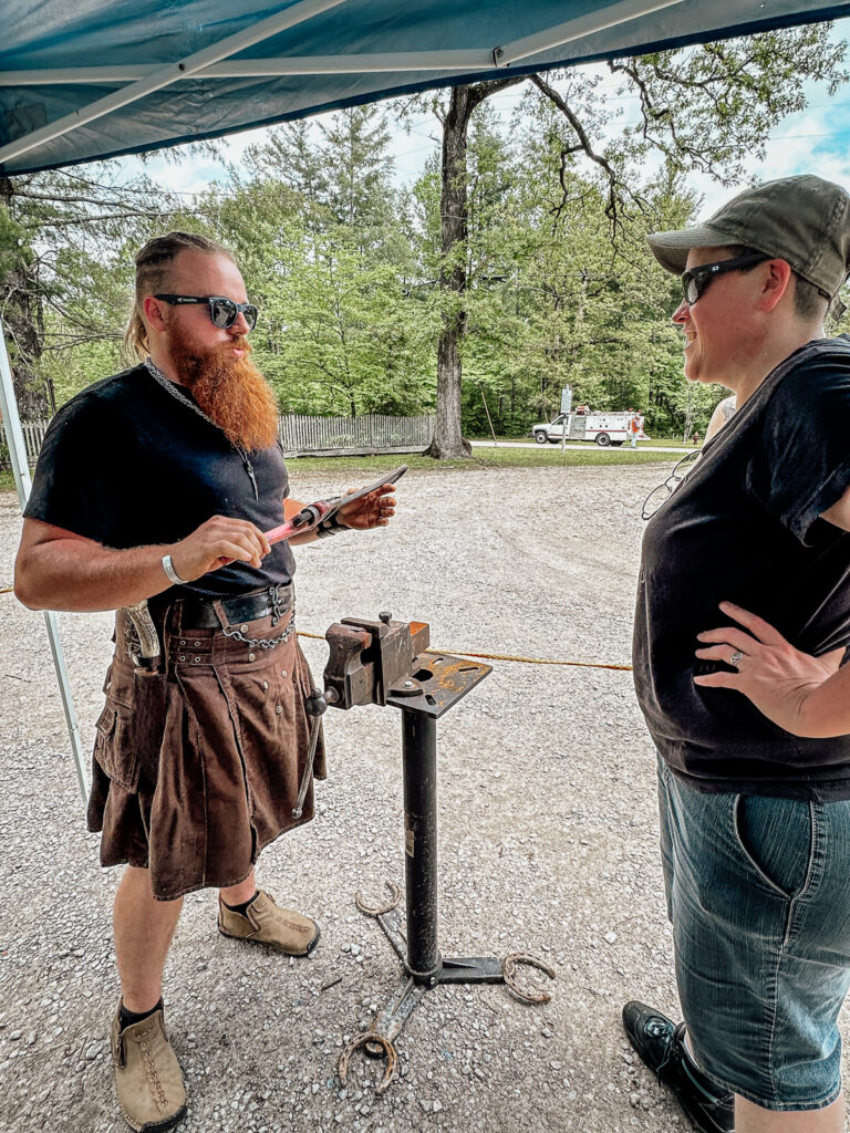 Trying our hand at the Blacksmith at the British Festival in Rugby Tennessee