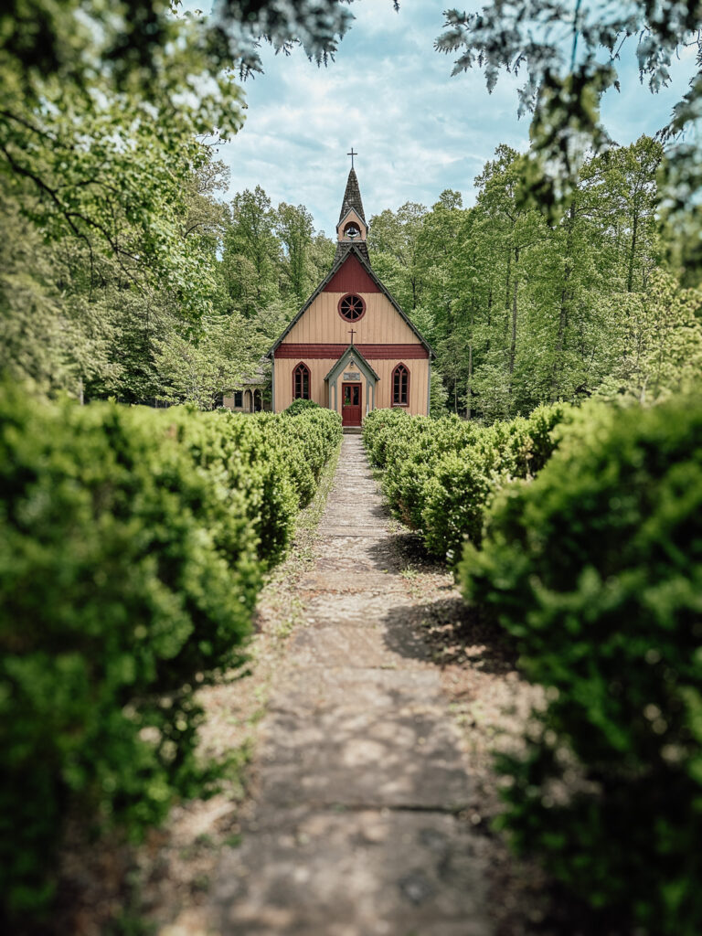 A path leads to the Christ Church building in Rugby, Tennessee