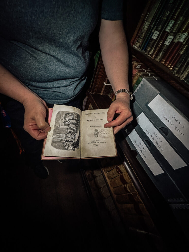 Inside of the historic library at Rugby Tennessee. Book handled by a professional.